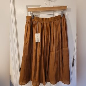 Shimmery orange skirt